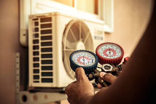 Professional Hvac technician working in Mayfield, PA